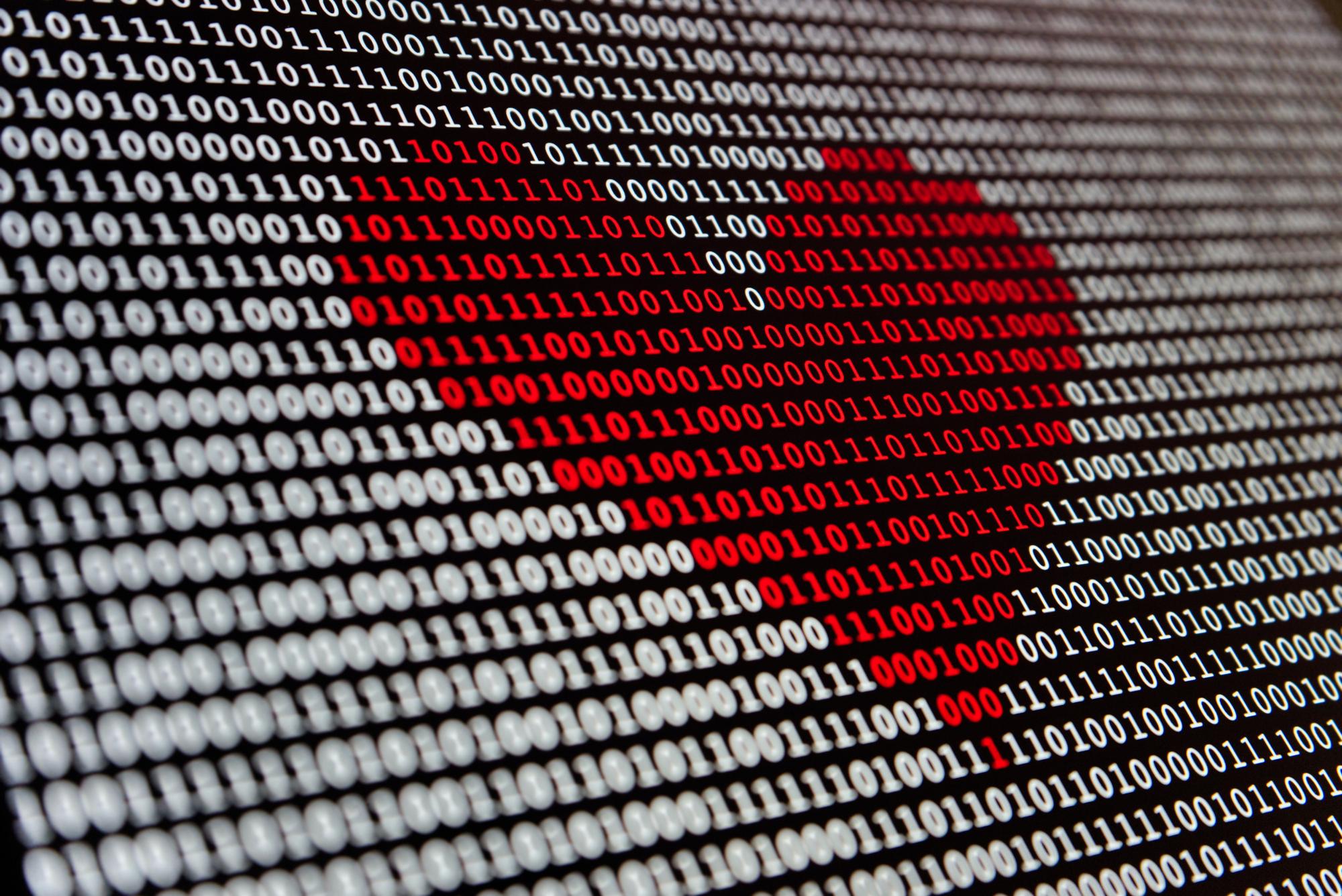 Image of a heart made of binary code.