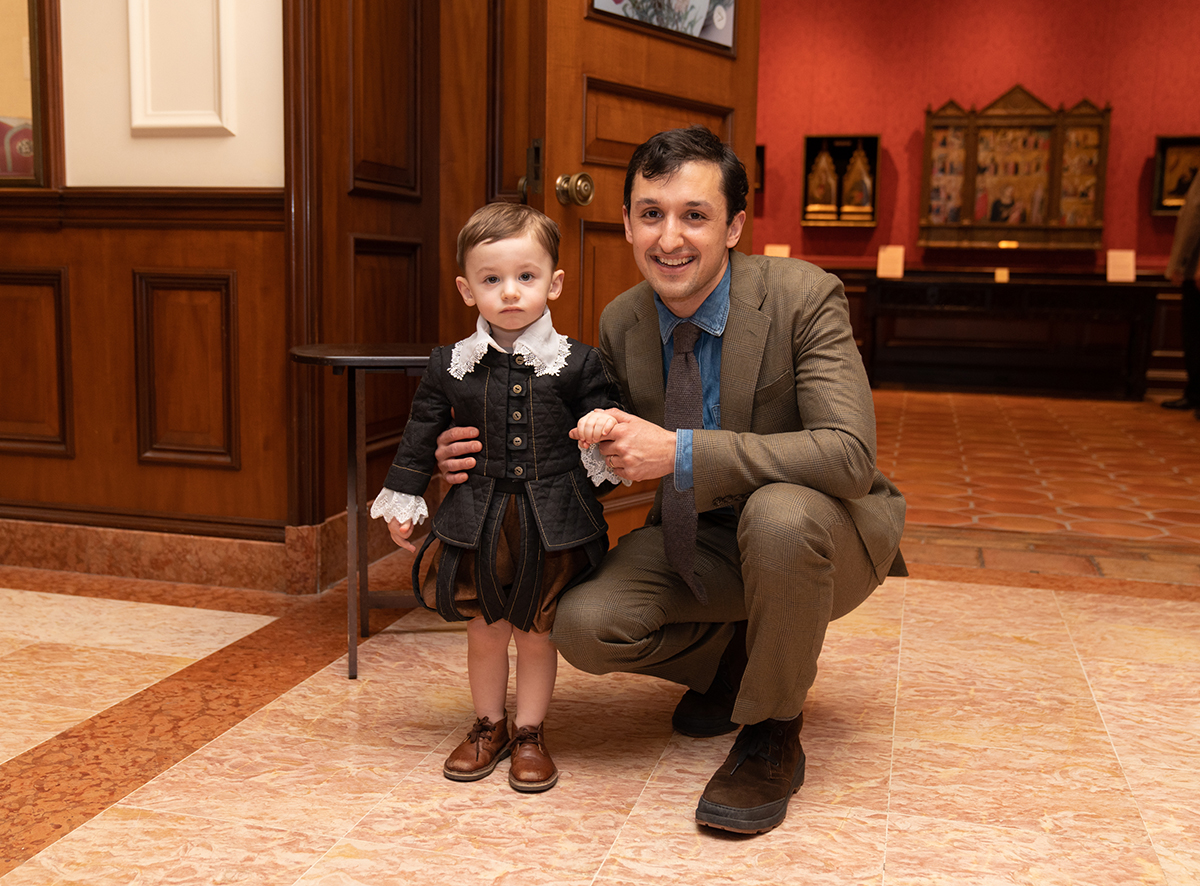 Curator of the exhibition, Sam Lemley, with Luca Lemley.