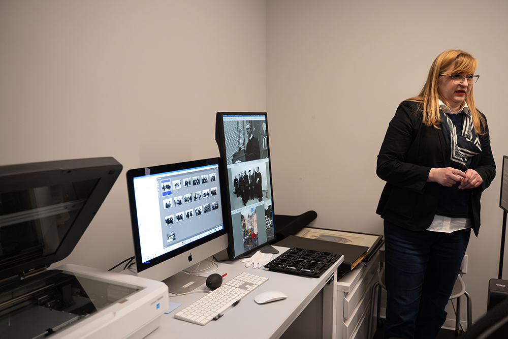Digitization Projects Manager and Data Deposit Coordinator Ann Marie Mesco explains the process of digitizing photos.
