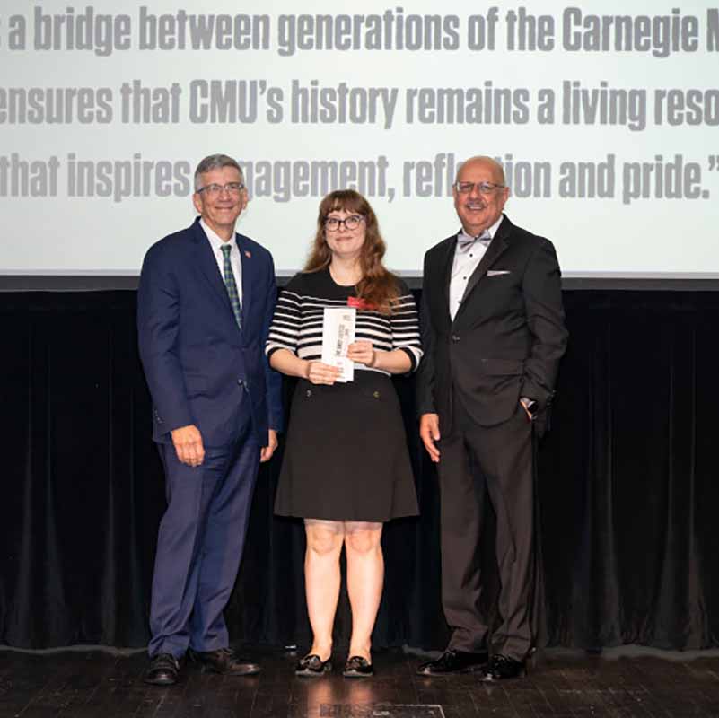 Crystal Johnson with Provost Jim Garrett (left) and CMU President Farnam Jahanian (right).