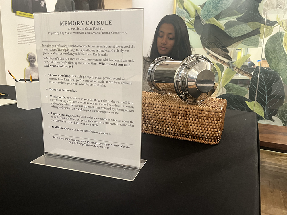 School of Drama students Madelyn Streisfeld and Alabaster Richard brought a time capsule for guests to add their watercolor paintings.